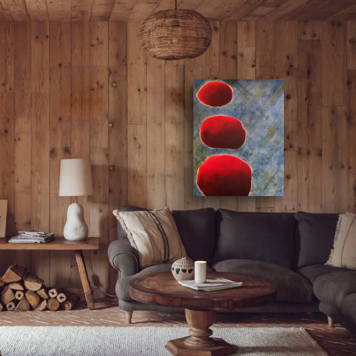 Maleriet "Tre elementer" 100x80 cm i rustikt stuemiljø med utstrakt bruk av treverk